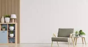 The,Interior,Has,A,Armchair,On,Empty,White,Wall,Background,3d